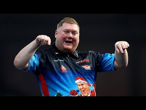 Darts Star Ricky Evans Wins a Christmas Cracker against Dave Chisnall at the World Championship